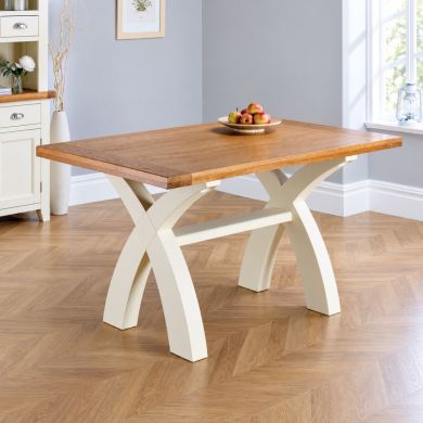 Country Oak 140cm cream painted cross leg dining table in a bright contemporary dining room