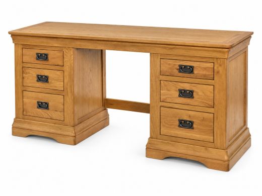 Farmhouse double-pedestal oak dressing table and desk with six drawers and antique ring handles, shown at an angle on a white background