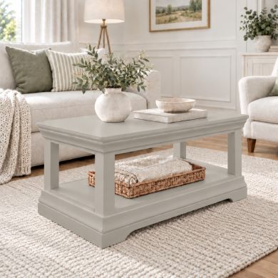 Toulouse grey painted coffee table with lower shelf in a bright neutral living room