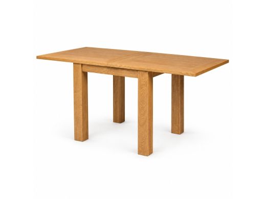 Lichfield oak flip-top dining table fully extended to 160cm in a bright dining room