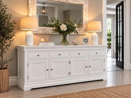Toulouse 200cm large white painted fully assembled sideboard with four drawers, four cupboard doors and chrome handles in a stylish modern hallway