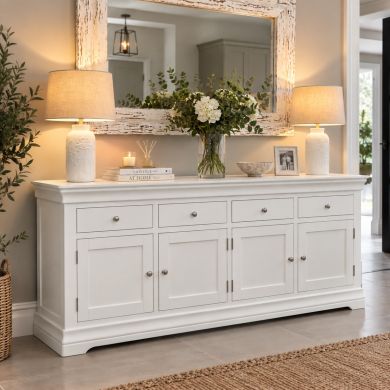 Toulouse 200cm large white painted fully assembled sideboard with four drawers, four cupboard doors and chrome handles in a stylish modern living room