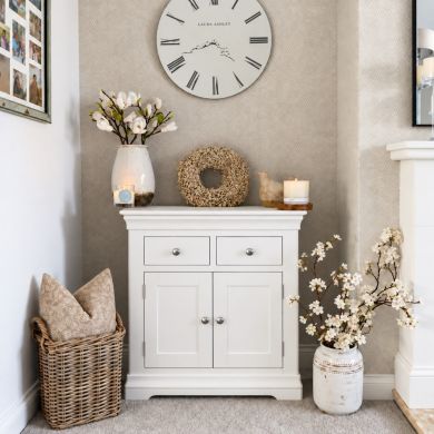 Toulouse white painted 80cm small sideboard with drawers and cupboard storage styled in a customer hallway alcove
