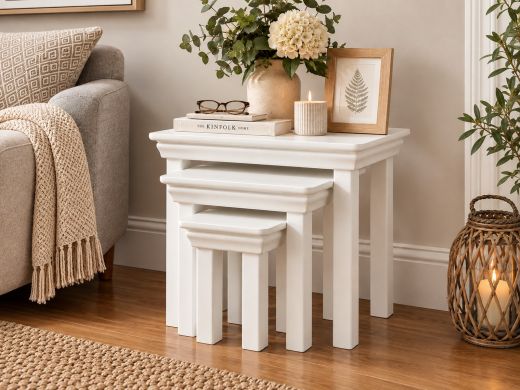 Toulouse White Painted Assembled Nest of 3 Tables styled in a neutral living room setting