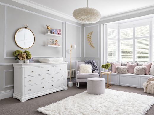 Toulouse white painted Grande 3 over 4 chest of drawers in a bright nursery