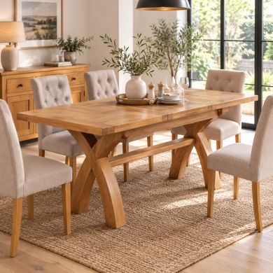 Country Oak 1.3m to 1.8m Cross Leg Oak Extending Dining Table in a bright modern dining room