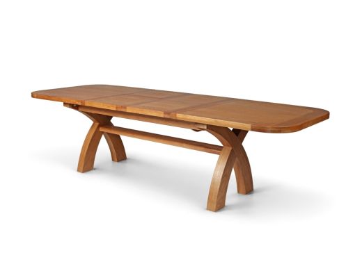 Country Oak dining table fully extended to 280cm with rounded corners and curved cross legs